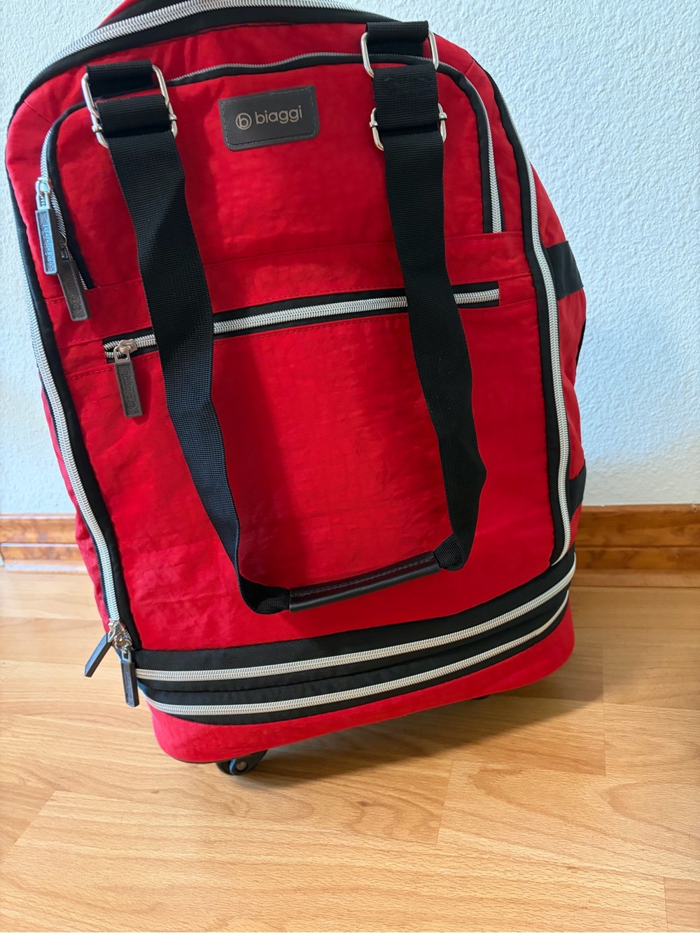 Biaggi Red Rolling Carryon Duffel Bag Zipsack Boost
